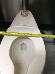 reflecting surface Centerline of toilet not 7"-8" from sidewall or partition in wheel chair accessible toilet