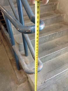 floor surface Modify handrail(s) to provide required extensions or replace per current