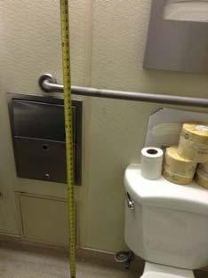 clearance or provide alternative accessible water closet Height of grab bar over 6" maximum AFF