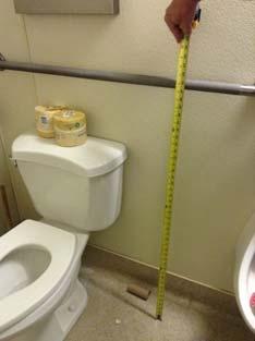 water closet per current standards Height of grab bar over 6" maximum AFF to top of gripping