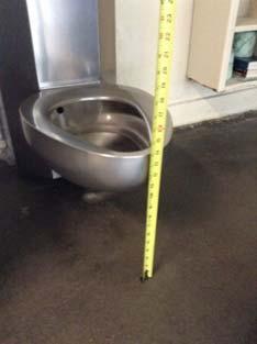 measured less than 7" AFF Provide water closet per current