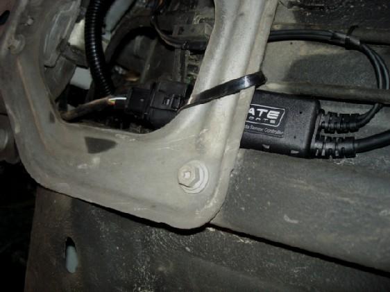 See nice and safe & simple securing method 150 Kg cable tie Of course you may choose to install the LC-1 electronics where the lead length will allow such as further up in the engine bay or even
