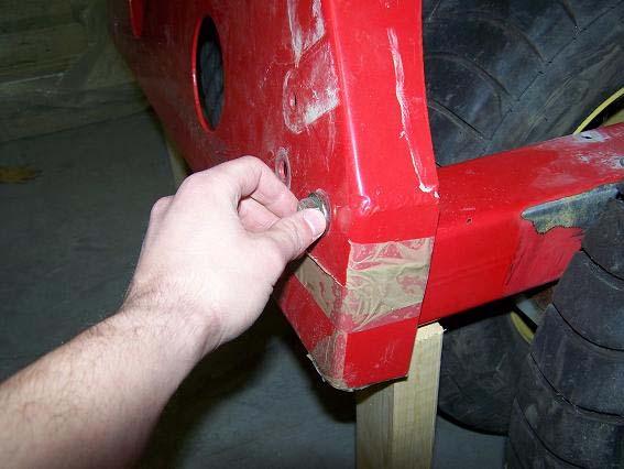 Figure 12: Install Front Brace Figure 10: Blocked Suspension Tubes 4. Install the Upper Cross Members with the same 12.