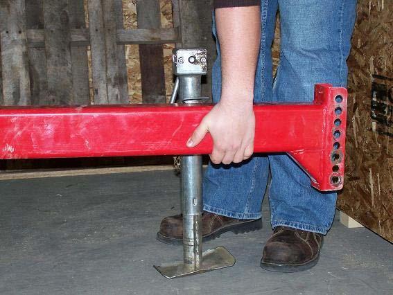 With the jack positioned perpendicular to the hitch tube, crank it up to its maximum stroke.