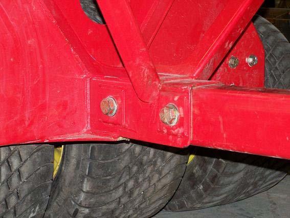 12. Slide the hitch tube into the channel and attach with two 19mm x 139.7mm (¾ x 5-½ ) bolts with 19mm (¾ ) washers.