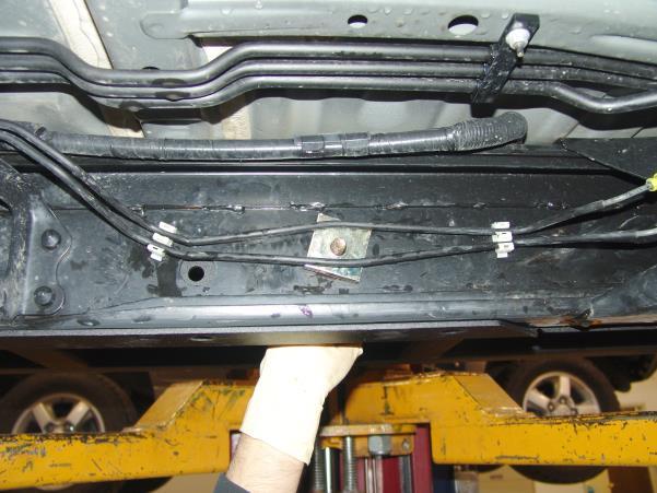 Do not attempt to hang the complete slider from this bolt. Make sure the slider is still supported by jack stands.