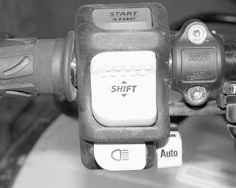 Vehicle must be running to allow gear change. The button must be released then pressed again to perform another gear shift. There are 5 gears in high and low gear positions.