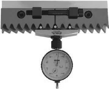 Adjust the measuring bridge on a measuring plate or other level surface to zero. Mount the adjusting device.