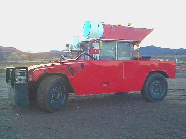 Figure 1: Sandstorm March 2004 1. Ground contact is four wheels: 37" diameter, 12.5" width, 130" wheelbase, and 72" track width (see Figure 2).