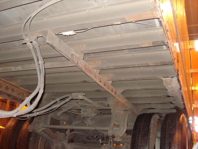 Note: For sliding suspension trailers, route all cables along the vehicle s