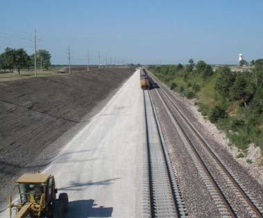 construction of 243 miles of main track including concrete ties,