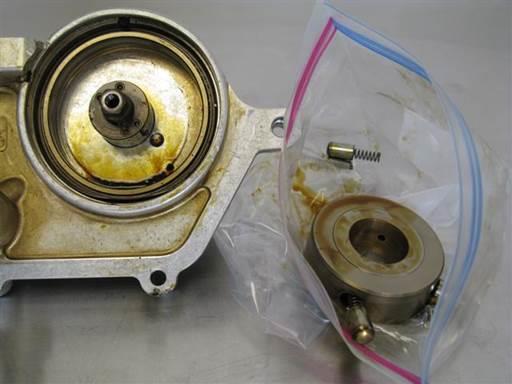 Remove plastic bag from vanos with oil pump