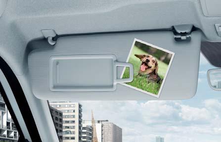 The sunglasses compartment is located above the interior rear-view mirror.