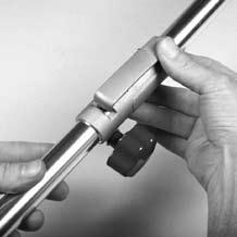 Loosen the shaft locking knob (14). (Fig. E) 3.