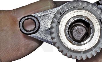 Install the magnetic roller drive gear and