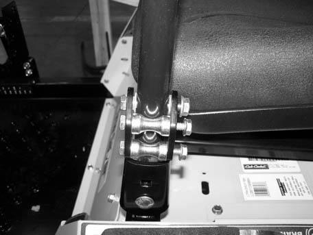 Using the hardware found in the manual bag, the control levers must be repositioned to operate the tractor.