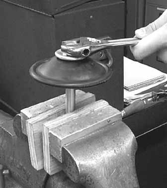 vise fitted with plywood or other suitable material) to ensure shaft is not nicked, scratched, or gouged.