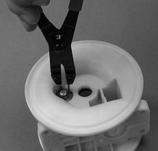 Gently remove the pilot spool from sleeve and inspect for nicks or gouges and other signs of wear.
