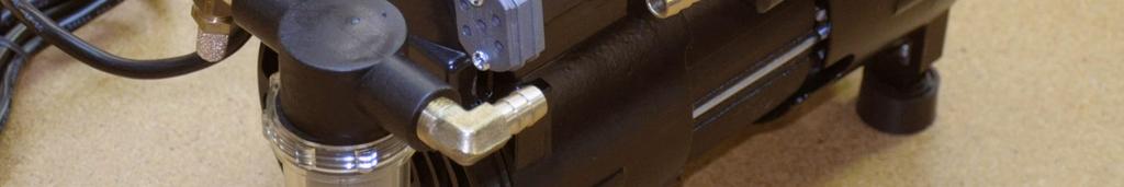 Mark a line where it will be cut so that it fits between the brass barbed elbow and the straight barbed fitting on the manifold.