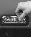 3. Remove the bulb. Taillamps 1. Open the tailgate. 2. Remove the screws from the lamp assembly near the tailgate latch. 4. Install a new bulb. 5. Replace the lens. Install and tighten the screws.