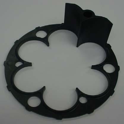 Figure 10 Cartridge Spacer Plate FSI recommends checking the gaskets and O rings for