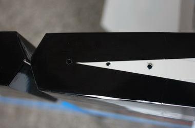 rudder, 200-220 mm away from the hinge