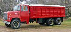 Grain Trucks & Trailer 1972 Ford 700 Tag Axle, s/n N70EVN91165, diesel, 182 hp, 5 spd, spring susp, 184 in. WB, 18 Ft steel box, hoist, hyd silage end gate, roll tarp, 34,634 miles showing.
