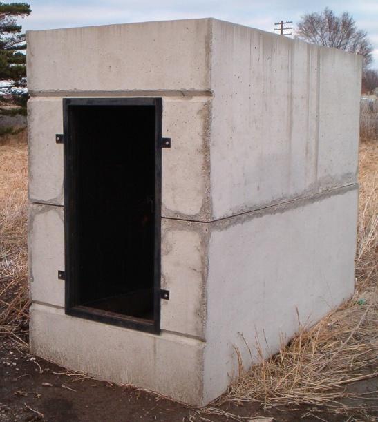 Storm Shelter Constructed from minimum 4,000 PSI vibrated concrete. Fiber Reinforced. Complete with steel door, skylights, and ventilation.