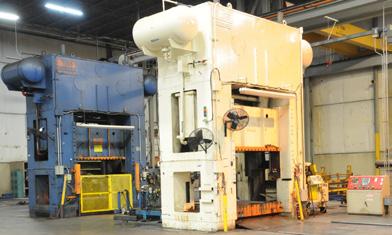 SIDE PRESSES DANLY SE2-1000-132-54 straight side press View of T-slot bolster tables available DANLY SE2-1000-132-54 straight side press with 1000 ton