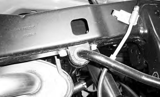 FIGURE 24R 46. Install sway bar drop brackets with OE sway bar mounting bolts to frame rails. Brackets will be offset toward the rear (Fig 25R). Mark the hole to the rear of the existing OE holes.