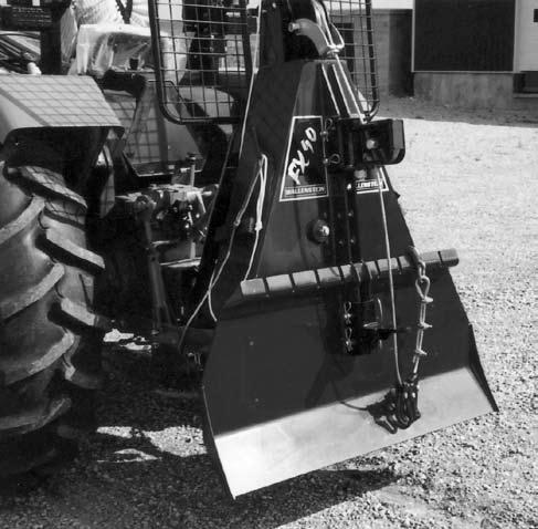 A blade on the back of the frame is used to anchor the machine when winching. The cable is routed out through the top of the frame and goes through a pulley and snatchblock.