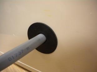 3) Push the self-adhesive seal onto the shank end of a 10mm dia drill bit then remove paper backing.