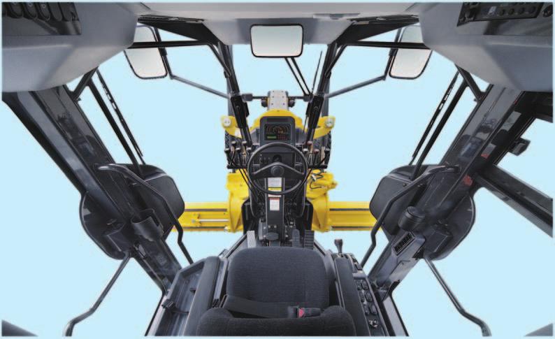 Air Conditioner Well-positioned air conditioning vents keep the operator comfortable through a wide range of outside conditions. Safety Machine Cab is low profile enclosed ROPS/FOPS.