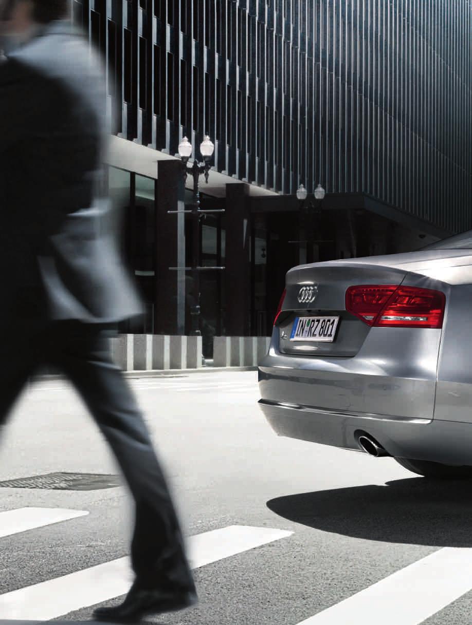 Below this line, the lively interplay of light and shade creates the side of the Audi A8.