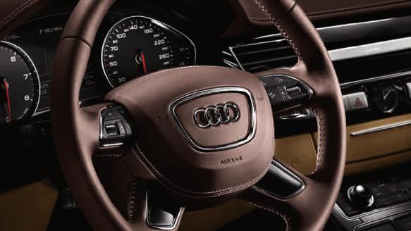 The selector lever in fine Nappa leather, colour-coordinated with your choice of interior colour sits pleasantly