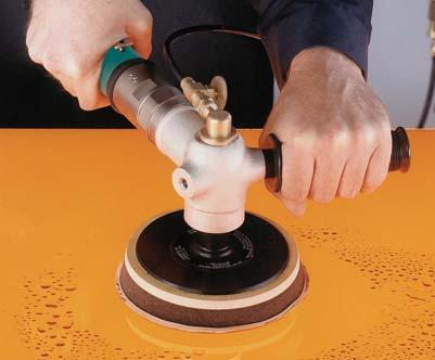 Water is fed through the center of pad directly to the work surface, providing optimum flushing of work surface and pad.