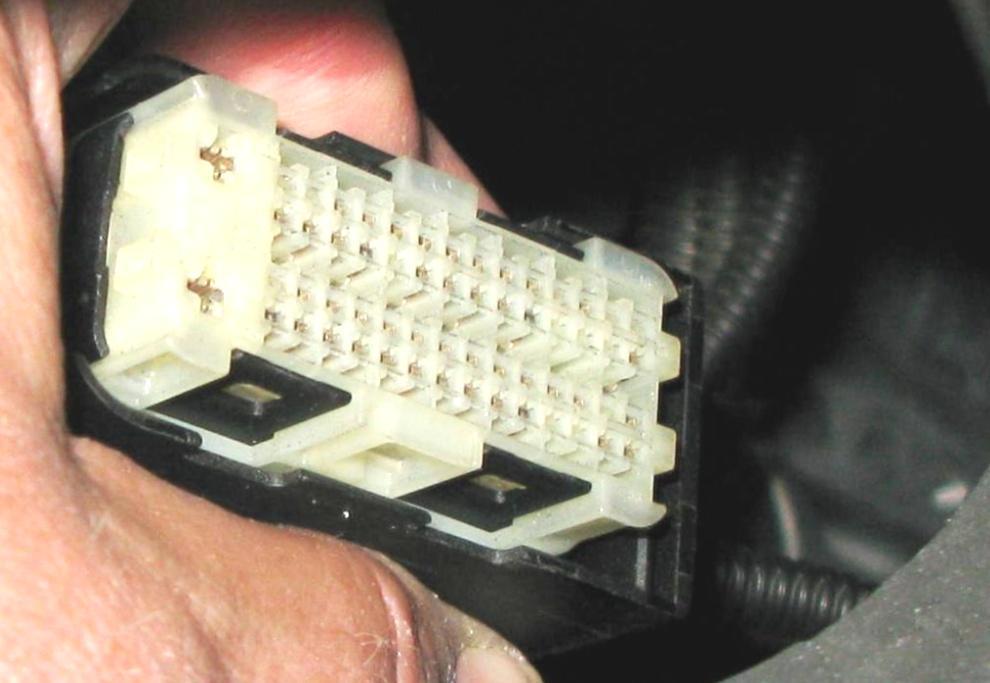 14. Install the Interrupt section that has the White Dot/Zip- Tie between position (2B) on the ECU and the stock connector that has 4 rows of small connectors, two large