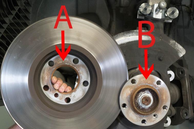 E4. Remove brake rotor and clean both rotor surface (A) and hub surface (B) of debris, rust and etc. E5.