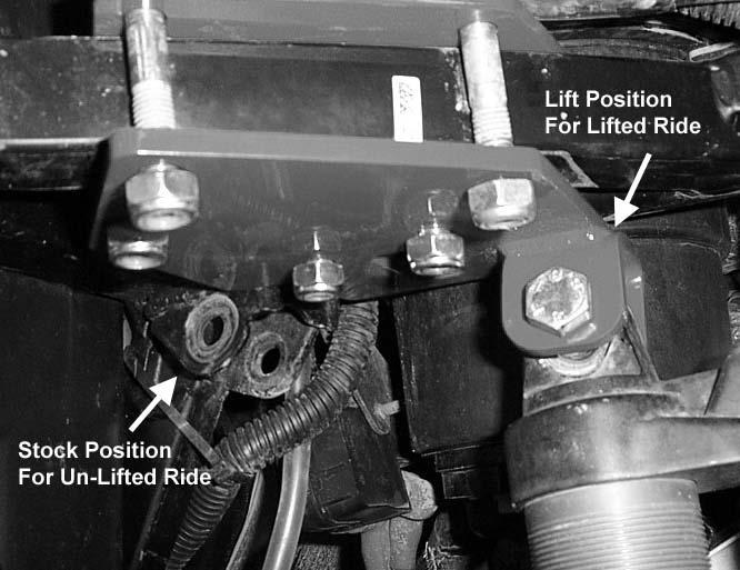 5. Once you have repositioned the shocks, torque all the nuts and bolts tight, you can then lower the jack. Rear Lift 1.