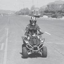 If you must ride on a paved surface, go slowly and do not make sudden turns or stops. Operating this ATV on public streets, roads or highways could be hazardous.