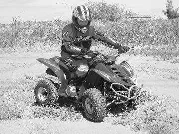RIDING YOUR ATV TURNING To turn the ATV, the rider must use the proper technique. Because this vehicle has a solid rear axle, both rear wheels always turn at the same speed.