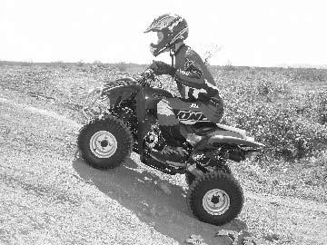 RIDING YOUR ATV Stalling, rolling backwards or improperly dismounting the ATV while climbing a hill could be hazardous. The ATV could overturn if you do not climb a hill properly.
