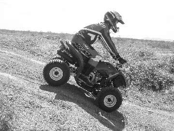 RIDING YOUR ATV Descending a Hill Going down a hill improperly could be hazardous. Going down a hill improperly could cause loss of control or cause the ATV to overturn.