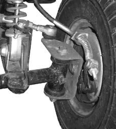 INSPECTION AND MAINTENANCE Front Brake Adjustment Nut 1 Nut 2 1. Try to move the vehicle backward and forward when the brake is applied.