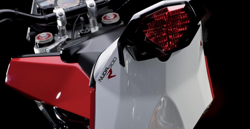 For them, the way a motorcycle looks is just as important as the way it handles - that s why the Nuda 900 has been designed to turn heads, stop traffic and invoke feelings of envy and desire in