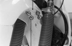BOTTOM PINCH BOLT STEERING STEM CLAMP SCREW BOOT Route the brake hose properly, then install the front brake caliper and tighten the mounting bolts to the