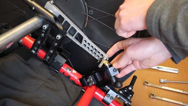 TORQUE ARM PIN ADJUSTMENT: If the location of the torque arm pin places the frame clamp in a location along the chair frame that is unaccessible due to other components, the torque arm pin can be