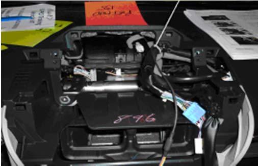 Fig. 4-5 Wire tie Sheet tape (e) Continue to route the connector end of the microphone cable along the OE harness to the right side of the center IP
