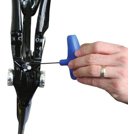 Spring tension will be higher on the non-drive side brake arm. (Figure 12) 25.