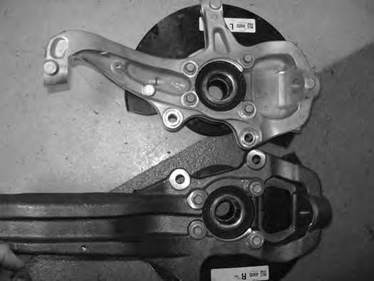 KNUCKLE ASSEMBLY 45. Remove the factory hub and dust shield from the stock knuckles. Transfer them over to the new steering knuckle.